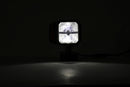 Proiettore a LED con freccia movibile e lente riscaldata